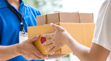 Customer handing over a parcel for delivery