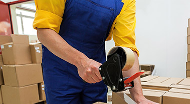 Worker packing ecommerce orders